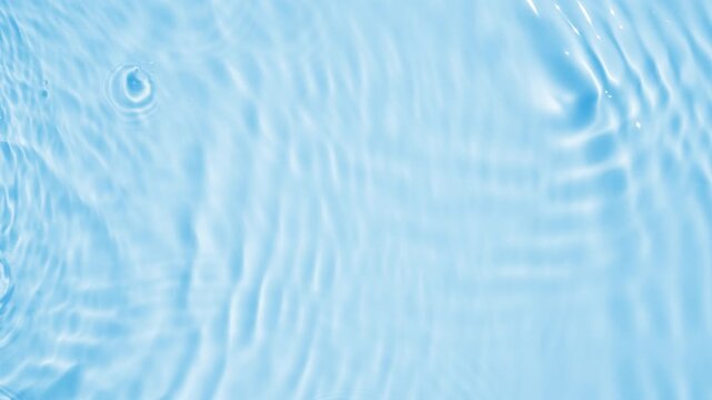 Abstract transparent water shadow surface texture natural ripple on blue background