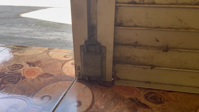 Close up of vintage rolling door lock mechanism details
