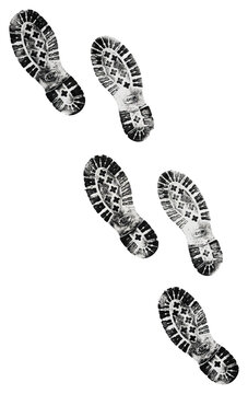 Footprints of a person walking on a white background.