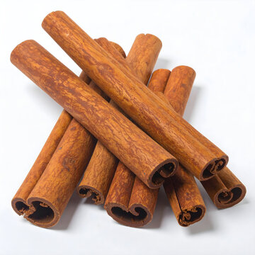 Heap of cinnamon cooking spice on white background