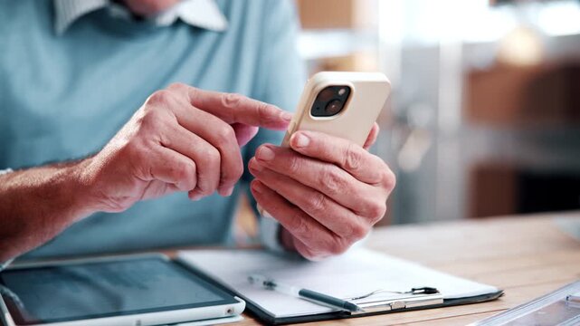 Man, hands and small business with phone for logistics, supply chain or delivery app. Male person, employee or scrolling with smartphone for freight schedule, online shipping or distribution in store