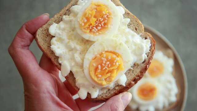 Healthy Toast with Cottage Cheese, Sliced Boiled Egg, and Sesame Seeds Close Up