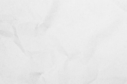 White recycled craft paper texture as background. Grey paper texture, Old vintage page or grunge vignette of old newspaper. Pattern rough art creased grunge letter. Hardboard with copy space for text.