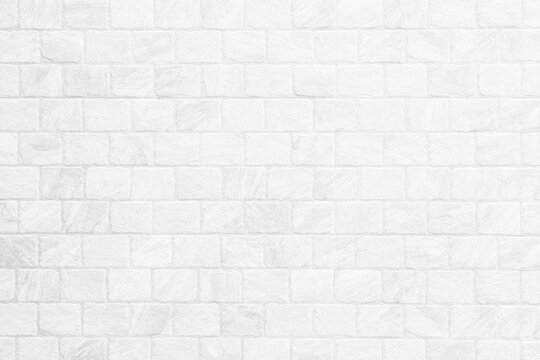Kitchen wallpaper concept: Close up modern white brick tiles wall texture background, wallpaper modern interior.