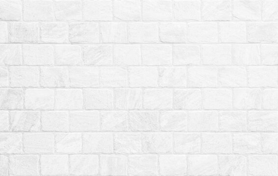 Kitchen wallpaper concept: Close up modern white brick tiles wall texture background, wallpaper modern interior.