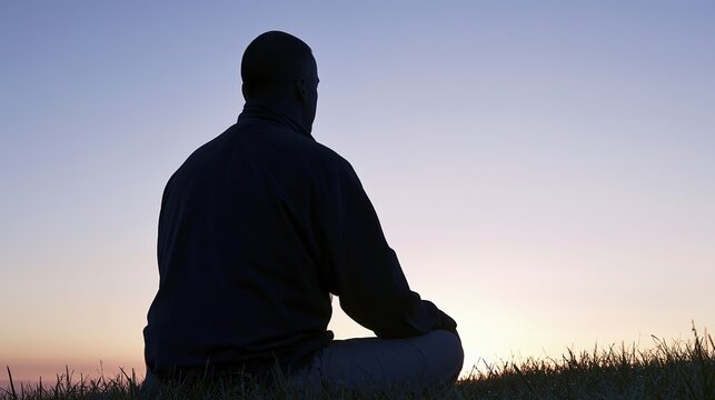 posture. A serene figure sits cross-legged against a gradient dawn sky, embodying tranquility and reflection. wellbeing guides, coaching materials, designed for coaching and self-improvement content.