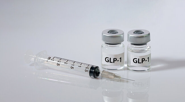 Hopeful patient seeks medical weight management using sterile syringe and hormone vial injection therapy for health improvement