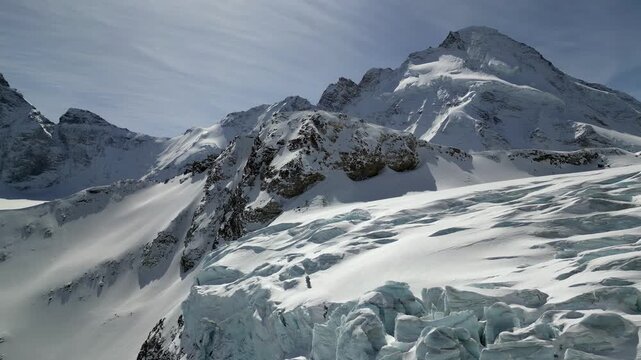 Aerial view of Schonbielhutte SAC nestled amidst the snow-covered peaks and glaciers of the Swiss Alps Zermatt, Wallis, Switzerland.