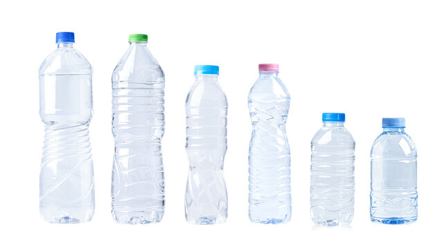 Vegetable oil and water in different bottle for cooking isolated on white background.