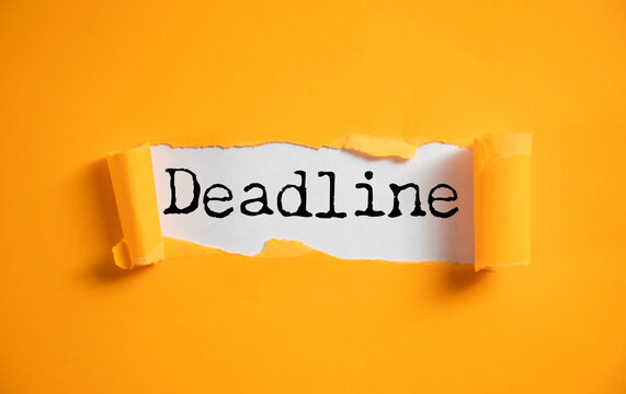 Sticker paper with word DEADLINE