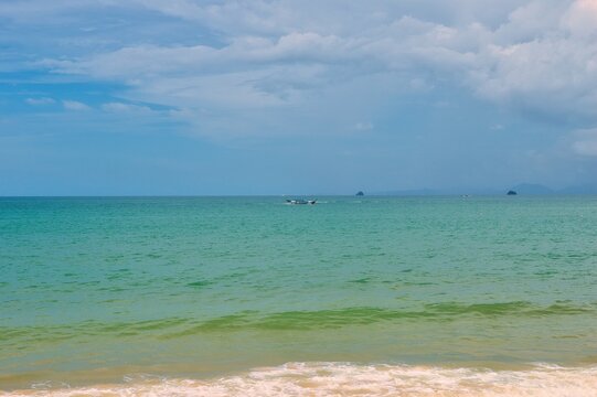 Thailand - Krabi - Ao Nang Beach July 22nd 2026. This was on a beautiful morning during the wet season. The Andaman sea during the low season surrounded by beautiful mountains.
