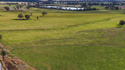Obraz premium Aerial View of Green Farmland and Rural Pastures in Tamworth