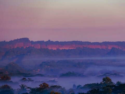 View of the misty hills of Nhila in Teknaf, featuring lush greenery and soft morning light, Cox's Bazar, Chittagong Division, Bangladesh.
