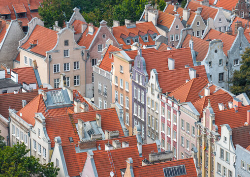 Aerial view of the historic architecture and red-tiled rooftops of the Old Town in Gdansk, Pomeranian Voivodeship, Poland.