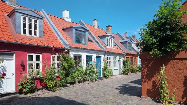 Mollestien is a historic, picturesque cobblestone street in Aarhus, colorful old houses. Steady shot.