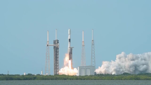 A stunning cinematic 4K video featuring a powerful rocket launch ascending into space with blazing engines, thick smoke, and dramatic liftoff from a modern launch pad.