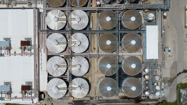 Aerial view of the Tropicana juice processing facility featuring large industrial storage tanks, complex piping systems, and manufacturing infrastructure in Bradenton, Florida, United States.
