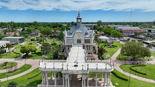 Aerial view of the Museo de Arte de Tigre with grand architecture, surrounded by manicured gardens, lush trees, and paved walkways in Tigre, Provincia de Buenos Aires, Argentina.