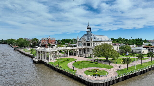 Aerial view of the Museo de Arte de Tigre situated on the riverbank with manicured gardens, ornate architecture, and a scenic waterfront in Tigre, Provincia de Buenos Aires, Argentina.