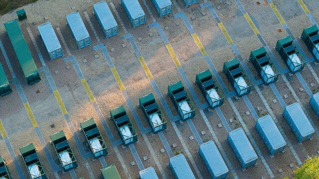 Aerial view of the Enderby Substation National Grid featuring rows of Battery Energy Storage Systems BESS containers arranged on a gravel site in Leicester, England, United Kingdom.