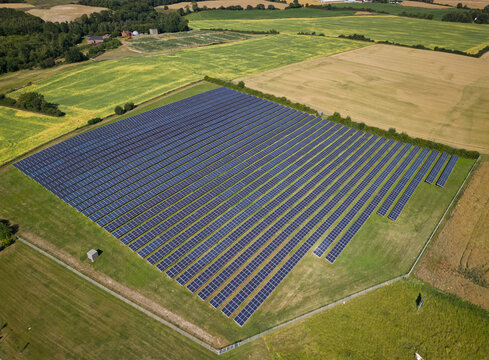 Aerial view of a solar farm located next to the Danfoss head office in Nordborg, Syddanmark, Denmark.