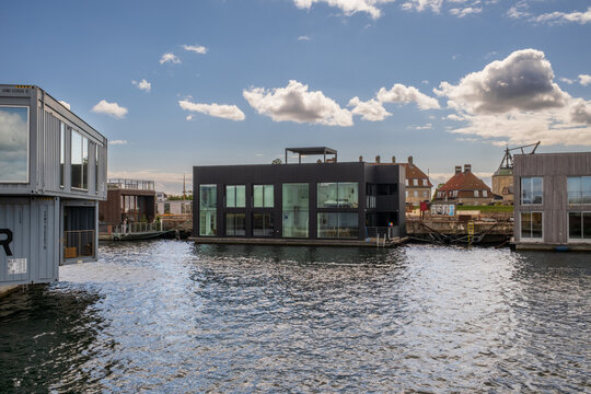 View of modern floating houses on the water in the harbor of Copenhagen, Denmark.