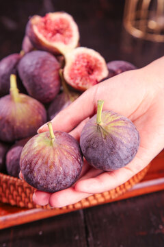 Fresh Purple Figs with Red Flesh in Hands - Yunnan Organic Fruit Harvest