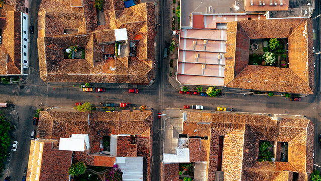 Aerial view of historic colonial architecture with terracotta-tiled roofs and inner courtyards in Suchitoto, Cuscatlan Department, El Salvador.