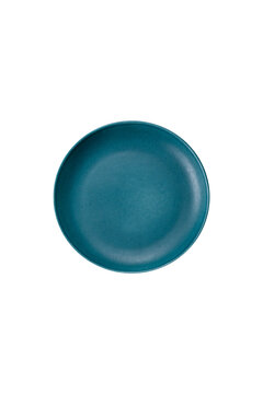 An empty round ceramic plate on a dark, textured brown background. An empty round plate