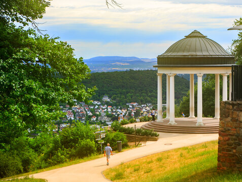 Scenic view from the hilltop in Rudesheim with the bandstand and mountains beyond.