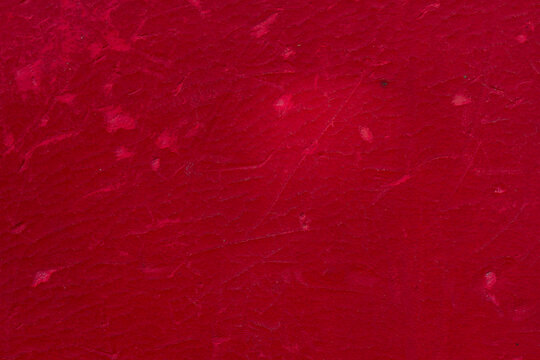 old red leather cracked scratches grunge texture background. copy space  for creative design.
