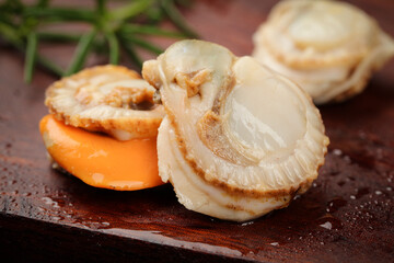 Fresh Qingdao Scallops with Shells on Wooden Board - Raw Seafood Preparation © KieuThi