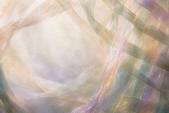 Ethereal pastel fabric background, soft iridescent textile texture, dreamy woven mesh material for elegant design backdrops