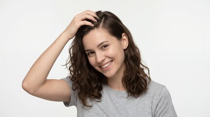 Naklejka premium Happy young adult touching healthy scalp after successful seborrheic dermatitis treatment, isolated white background
