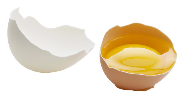 Broken white eggshell half and brown eggshell half with yolk and white, isolated on transparent background