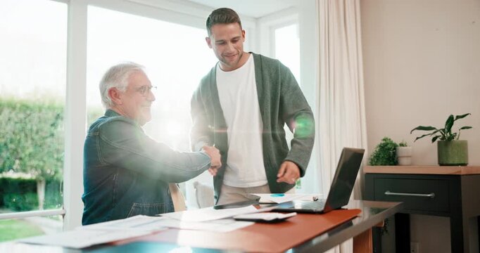 Father, handshake and adult son in home office with inheritance document, trust fund or finance deal. Flare, happy senior dad and men shaking hands for asset transfer, family business and investment.