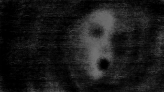 Screaming ghost face emerging through dark static noise background in cinematic monochrome horror sequence.
