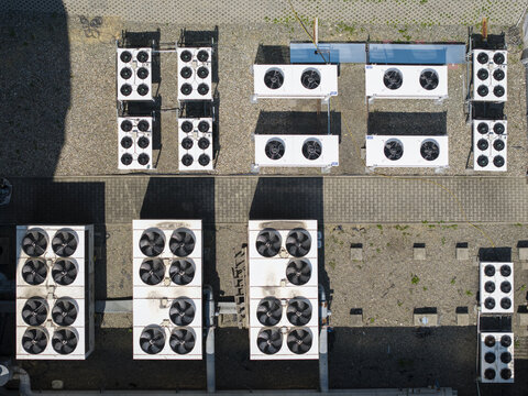 Aerial view of industrial cooling units and ventilation systems installed on the roof of an ai data center in Krakow, Lesser Poland Voivode, Poland.