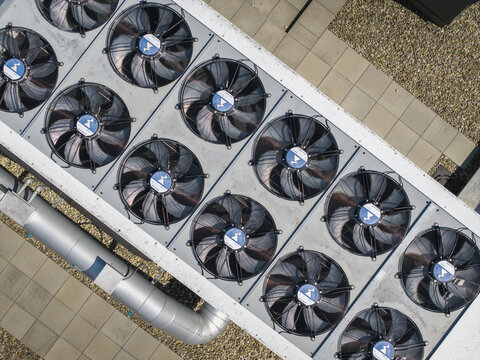 Aerial view of industrial cooling fans on the roof of an ai data center, Krakow, Lesser Poland Voivode, Poland.