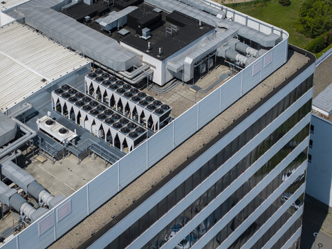 Aerial view of ai data center rooftop with industrial cooling units and ventilation systems in Krakow, Lesser Poland Voivode, Poland.