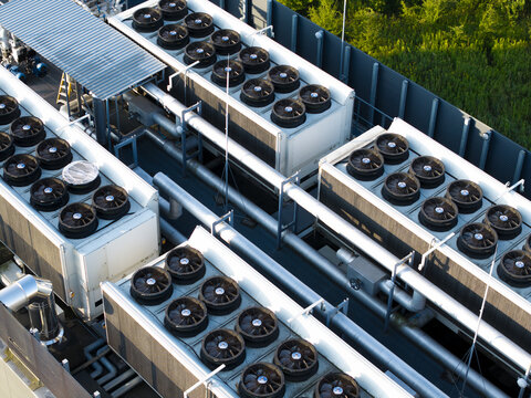 Aerial view of the cooling system units on the roof of an ai data center in Krakow, Lesser Poland Voivode, Poland.