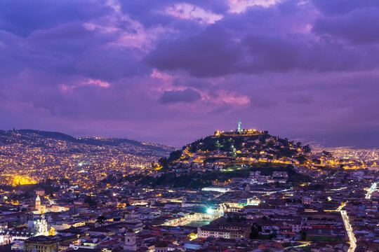 Ecuador, Quito, cityscape with El Panecillo at sunset