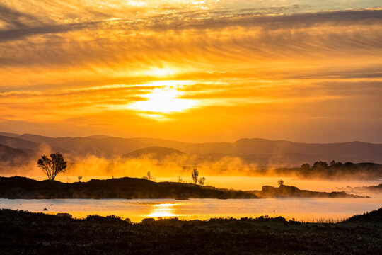Great Britain, Scotland, Scottish Highlands, Glencoe, Rannoch Moor, Sunrise over Loch Ba