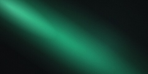 Fototapeta premium A diagonal beam of bright mint green light glowing against a deep dark black textured background area