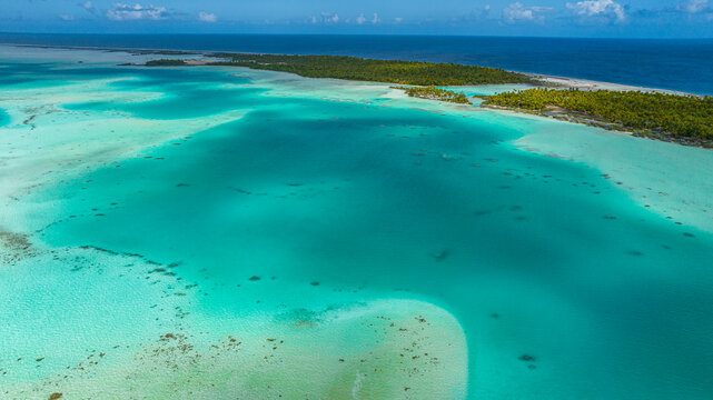 Aerial view of the green lagoon in Fakarava, French Polynesia