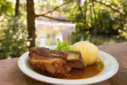 Germany, Nuremberg, traditional pork dish Schaeufele in Restaurant Kettensteg
