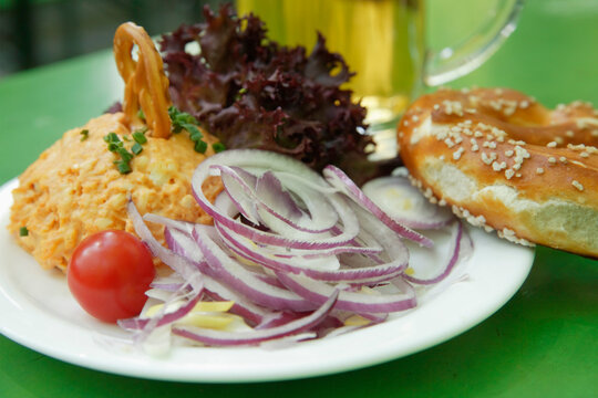 Germany, Bavaria, Munich, Vegetarian dish with mug of beer, close up