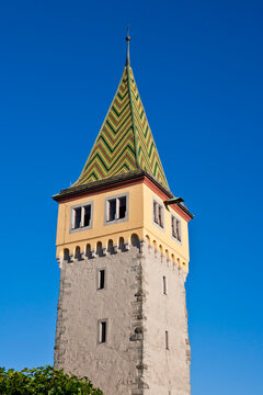 View of the Mangturm building at the harbor in Lindau, Bavaria, Germany