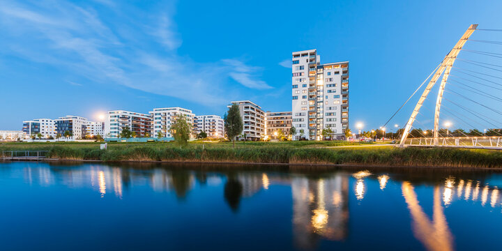 Germany, Sindelfingen, Boeblingen Flugfeld, view to development area at Langer See at twilight
