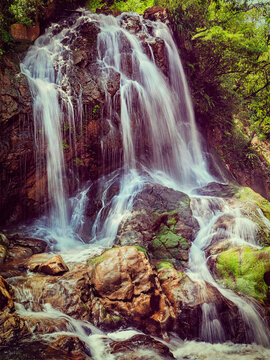Vintage retro effect filtered hipster style view of Tien Sa Waterfal near Cat Cat Village near (Sapa) Sa Pa, Vietnam - popular tourist trekking destination
